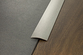 Деревянный, металлический, пластиковый напольный плинтус.