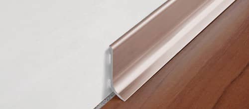 Деревянный, металлический, пластиковый напольный плинтус.