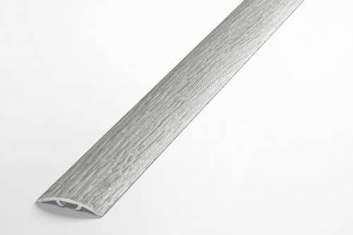 Деревянный, металлический, пластиковый напольный плинтус.