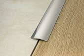 Деревянный, металлический, пластиковый напольный плинтус.