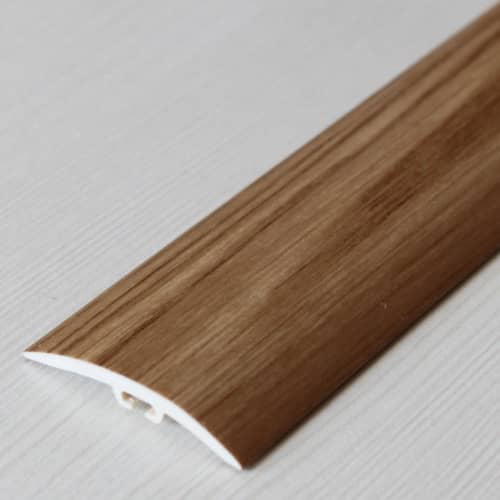 Деревянный, металлический, пластиковый напольный плинтус.